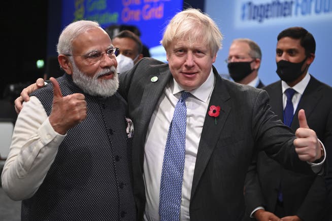 Hat die Klima-Experten zuversichtlich gestimmt: das Versprechen des indischen Premiers Narendra Modi, hier auf einem Gruppenbild mit Gastgebern Boris Johnson.