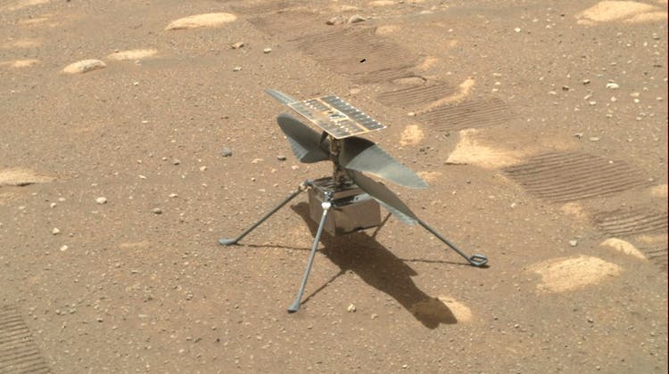 epa09119784 A handout photo made available by NASA shows an image of NASA's Ingenuity Helicopter acquired by NASA's Perseverance Mars rover using its SHERLOC WATSON camera, on Sol 46, the 46th Martian day of the mission, 07 April 2021. The helicopter was released by the rover after being charged and is expected to fly in a dedicated fly zone no earlier than 08 April. Having landed on Mars on 18 February, Perseverance's main mission on Mars is astrobiology and the search for signs of ancient microbial life, according to NASA.  EPA/NASA/JPL-Caltech/HANDOUT  HANDOUT EDITORIAL USE ONLY/NO SALES (Nasa/Jpl-Caltech/Handout / EPA)