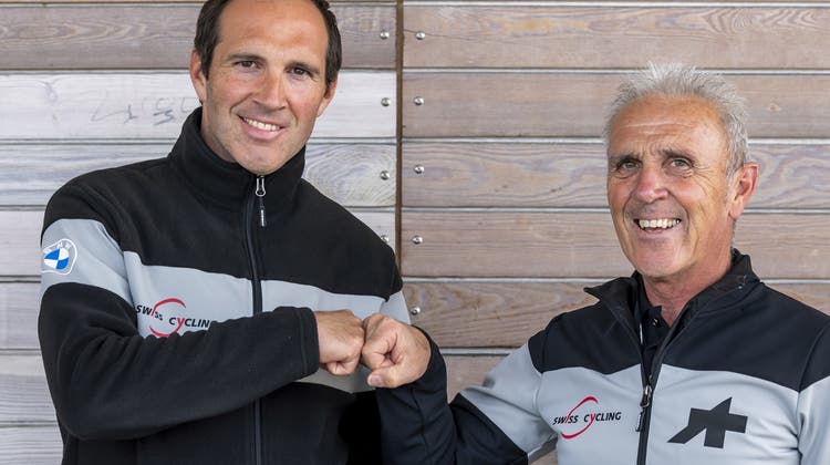 Michael Albasini (links) ist Nachfolger seines Vater Marcello als Nationaltrainer. (Bild: Jean-Christophe Bott/Keystone)