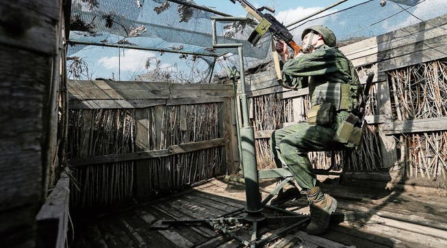 Prorussischer Rebell in Donetzk: Der Konflikt in der Grenzregion spitzt sich zu.