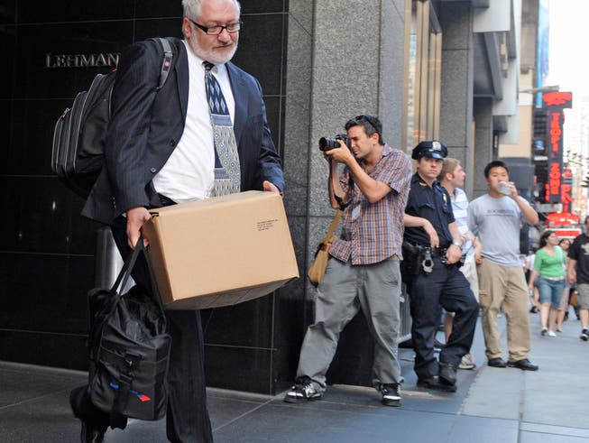 Symbol der Finanzkrise: Lehman-Banker packen ihre Siebensachen.