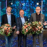 Die drei glücklichen Gewinner: Patrick Suter (Erne AG Holzbau), Peter Schmidt (SwissBeam AG)  und Lukas Bättig (Bütler Elektro, von links). (AKB / Sandra Ardizzone)