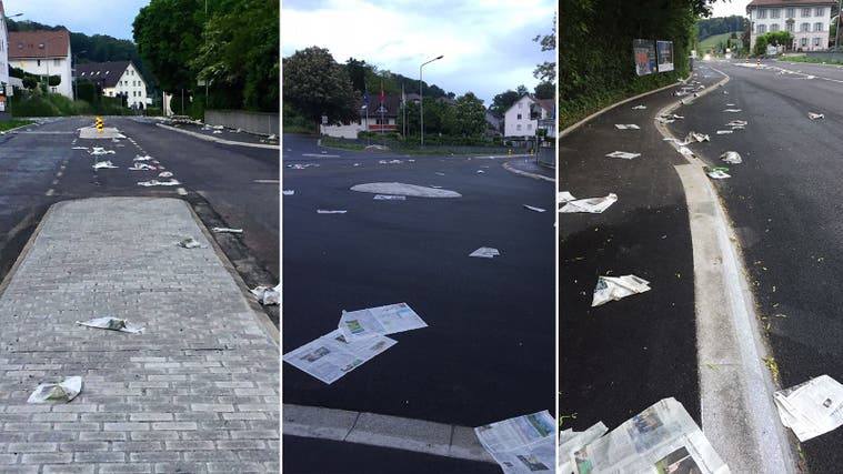 Die Zeitungen wurden vermutlich aus dem fahrenden Auto auf die Strasse geworfen – hier Bilder vom 13. Mai aus der Badenerstrasse in Eggenwil. (zvg)