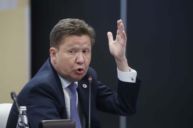 Power play: Alexei Borissowitsch Miller, CEO of Russian energy giant Gazprom, is limiting gas supplies to Germany.  Pictured, he is chatting at the St Petersburg International Economic Forum on Thursday this week.
