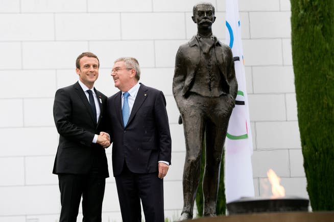 Macron und Bach, hier bei einem Treffen 2017 in Lausanne.