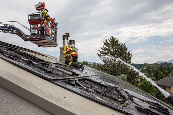 "Big Smoke" at Former Mayor's House Fire brigade extinguishing burning solar system.