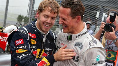 Erinnerung an bessere Zeiten für den deutschen Formel-Sport: Insgesamt elf WM-Titel gewannen Sebastian Vettel (l.) und Michael Schumacher (r.). (Jens Buettner / EPA)