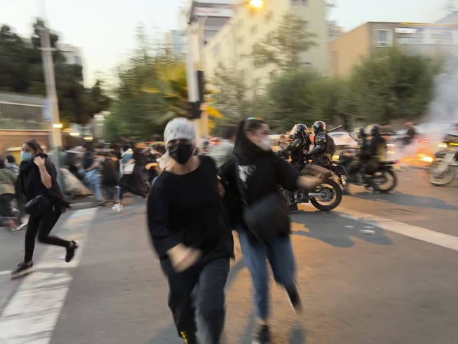 Protests in downtown Tehran after the 22-year-old's death.
