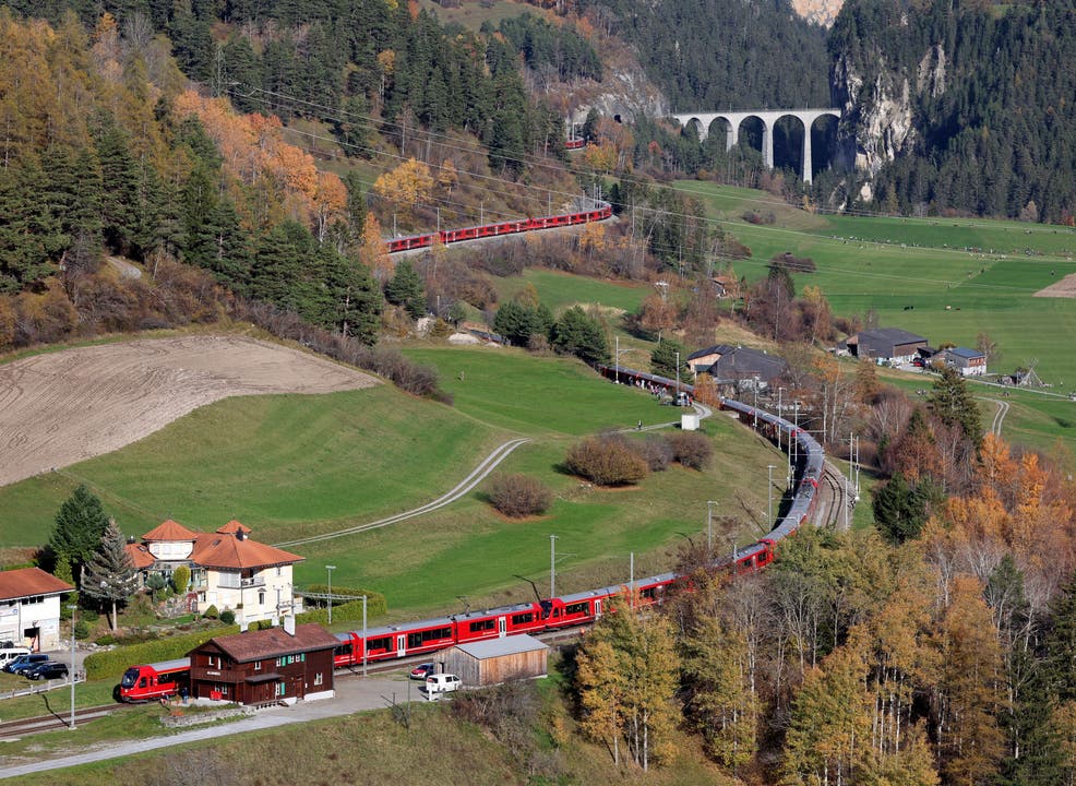 The train as it winds its way down the valley towards Alvaneu from the Landwasser viaduct. The train's 25 units would be separated here and dispatched back to their depots. 
