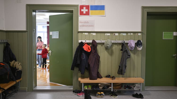 Integration auf allen Ebenen: Eine Willkommensnachricht an einer Schweizer Schule. (Keystone)