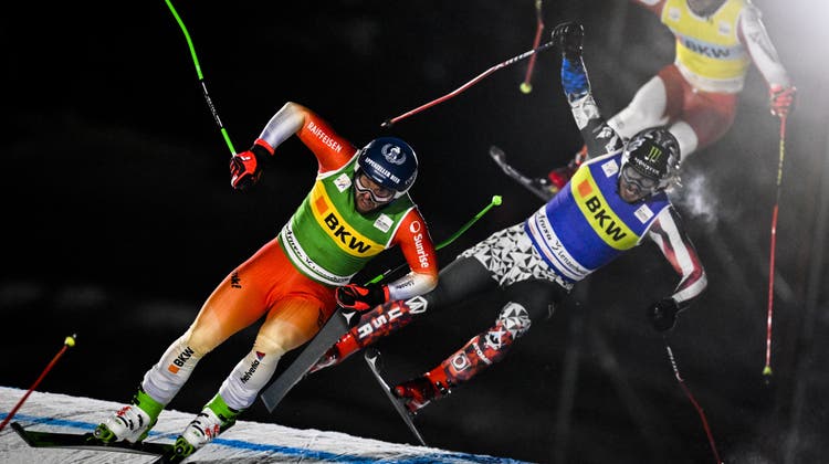 Verbissener Kampf um Zentimeter auf der Skicross-Piste mit Marc Bischofberger (links). (Gian Ehrenzeller / Keystone)