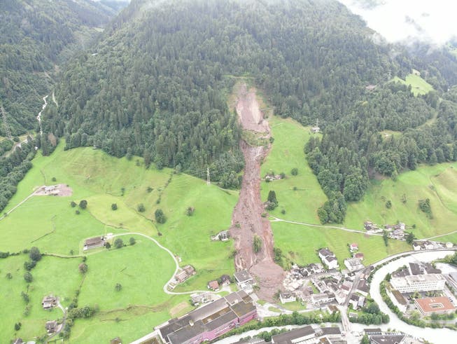 The landslide brought a lot of debris and mud to the village.